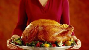 woman-with-roast-turkey